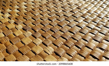 Close up detail of flax weaving on a panel
