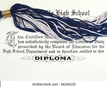 Close Up Detail Of A High School Diploma With Tassel From Cap