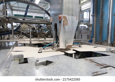 Close Up Detail Of Industrial Machinery At Work In A Production Line, Conveyor Belts Are Visible, No People Are Present.