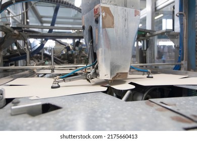 Close Up Detail Of Industrial Machinery At Work In A Production Line, Conveyor Belts Are Visible, No People Are Present.