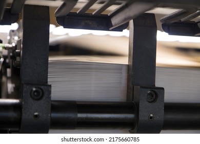 Close Up Detail Of Industrial Machinery At Work In A Production Line, Conveyor Belts Are Visible, No People Are Present.