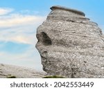 Close up detail with the natural rock formation in the Bucegi Natural Park which is in the Bucegi Mountains of Romania called The Sphinx (Sfinxul)