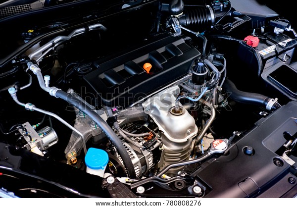 Close up detail of new car engine The\
powerful engine of a car. Internal design of\
engine