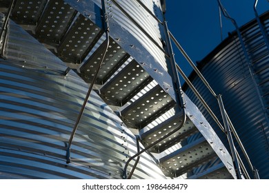 A Close Up Detail Photo Of A Shiny Metal Grain Storage Bin In Western Canada