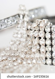 Close Up Detail Still Life View Of Exclusive And Luxurious Diamond Bracelets, Engagement Rings And Earrings. A Multiple Quality Diamond Detail Jewelry Shining And Sparkling With Light, Interior.