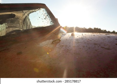 A Close Up Detail View Of A Muddy Off Road All Terrain Vehicle.