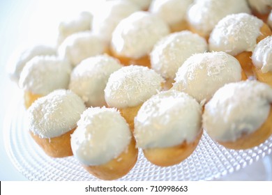 close details of white tasty mini eclairs - Shutterstock ID 710998663