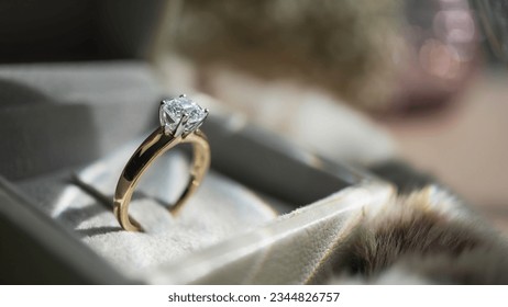 Close up of diamond ring with sunlight and shadow background. Love, valentine, relationship and wedding concept. Soft and selective focus. - Shutterstock ID 2344826757