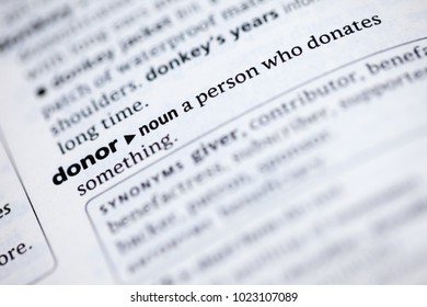 Close up to the dictionary definition of Donor