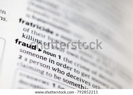 Close up to the dictionary definition of Fraud