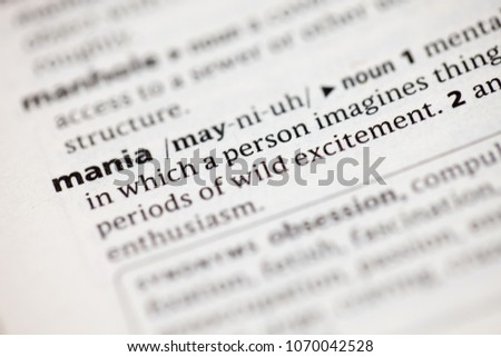 Close up to the dictionary definition of Mania