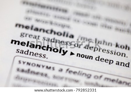 Close up to the dictionary definition of Melancholy