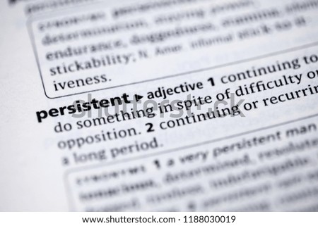 Close up to the dictionary definition of Persistent