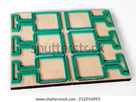 Close up die cut mold wooden board cutter Isolated on White Background