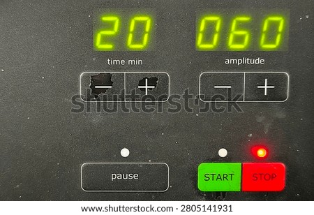 Close Up of Digital Control Panel Display showing Time and Amplitude Parameters