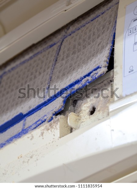 close up\
dirt air conditioner filter. Danger and the cause of pneumonia and\
respiratory diseases in house or\
office.