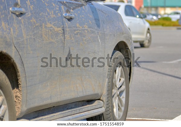 Close up of a dirty car in\
the city