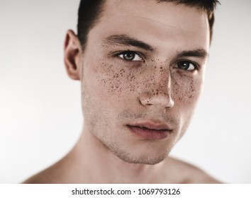 Close Up Dirty Face Of Serious Nude Man Watching At Camera