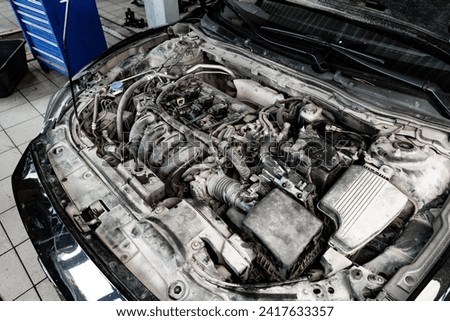 Similar – Truck Engine Motor Components In Car Service Inspection