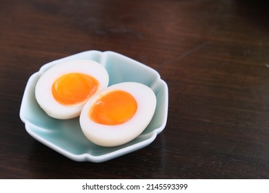 close up a dish of soft boiled egg on table.  - Powered by Shutterstock