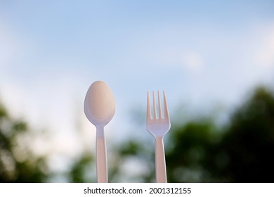 Close Up Of Disposable Plastic Fork And Spoon