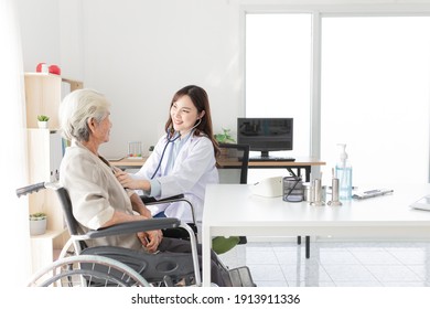 Close Up Doctor, Asian Doctor Talk With Old Female Patient About Disease Symptom, Doctor Use Stethoscope Listening Lung Of Patient, Elderly Health Check Up, Happiness Hospital