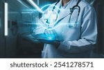 Close up of doctor with lab coat holding tablet with medical cross floating. Skilled medical worker searching diagnosis data and checking emergency service by using technology innovation. Remedial.