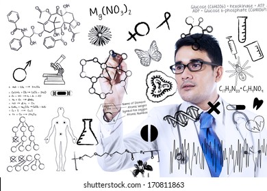 Close Up Of Doctor Is Writing Medical Concept On Transparent Whiteboard