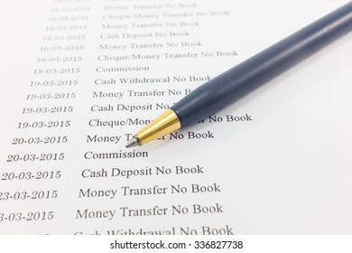 Close up document of bank statement with pen : Can use for financial background.