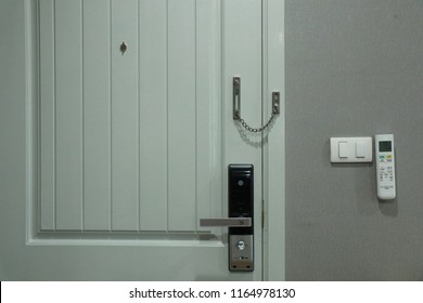 Close door and digital door lock, door chain and switchboard for protection and safety home                                     - Powered by Shutterstock