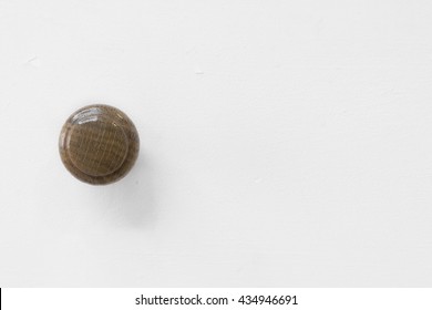 Close Up Of Door Knob On Cabinet.