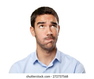 Close up of a doubtful young man - Shutterstock ID 272737568
