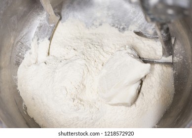 Close Up Of Dough In Electric Bakery Mixer