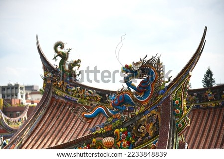 Close Up The Dragon Statue at the roof of Dalongdong Baoan (Bao An) Temple (2003 the UNESCO Asia-Pacific Heritage Awards for Culture Heritage Conservation) 