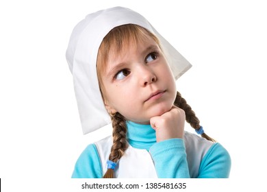 Close Up Of Dreamy Female Nurse Looking Aside Up, Hand Under The Chin. Landscape White Orientation