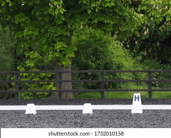 A Close Up Of A Dressage Arena Showing The White Boards