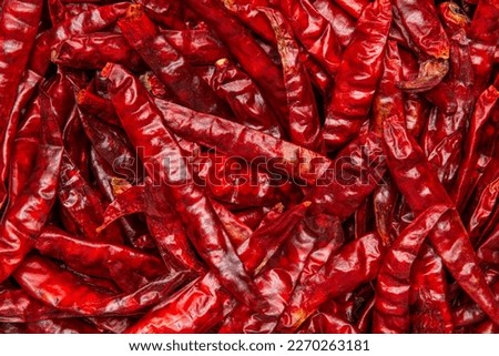 Close up dried chilli background. Red hot chili wallpaper.