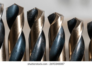 Close up drill bits in a row