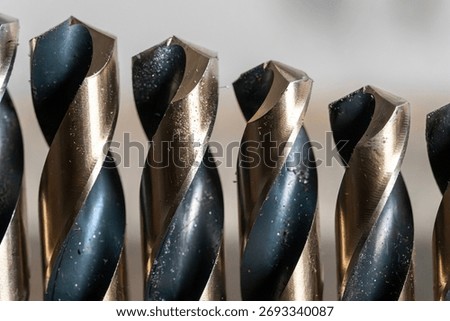 Close up drill bits in a row