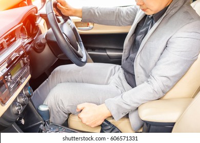 Close Up Of Driver Pulling Handbrake Lever In Car.