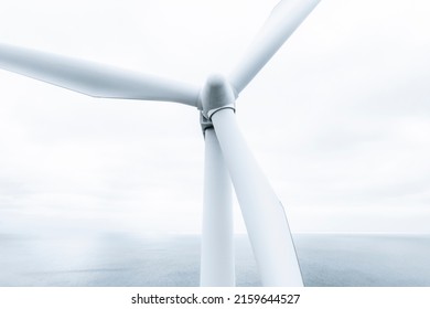 Close Up Drone Image Of Wind Turbine In The Ocean.