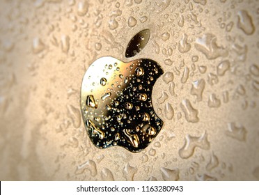 Close Up Of Drops Of Water On The Trademark Of The Apple Company. 8/24/2018. Russia. Editorial Image. Horizontal Format. Color. Stock Photo.