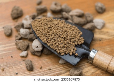 Close up dry Akadama soil or Japanese soil. Akadama is mostly used in the growing of potted plants, bonsai trees, cactis and succulents. - Powered by Shutterstock