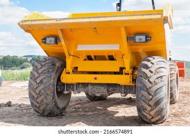 Close up of dumper truck tyres on construction site