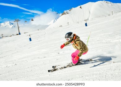 Close up Dynamic banner of woman skier on piste ski downhill fast motion in Alps. Active winter holidays, skiing downhill in overcast day. Ski rides on the track with swirls of fresh snow - Powered by Shutterstock