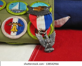 Close Up Of An Eagle Scout Award Sitting On A Flag