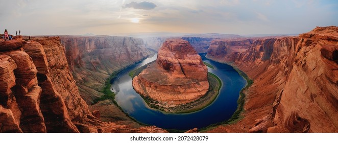 Close to the edge. Panoramic view at Horseshoe Bend, a meander of Colorado river in Grand Canyon National Park, Arizona, United States.