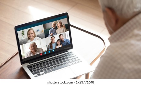 Close Up Of Elderly Man Talk Speak With Diverse Relatives On Video Call Using Modern Tablet Quarantine At Home, Mature Grandfather Have Online Web Conversation Conference With Family On Computer