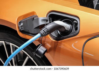 The close up of electric car charging plug.