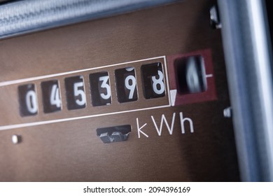 Close up of electricity meter with rotating digit. - Shutterstock ID 2094396169